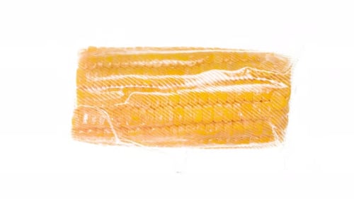 Ears of Corn Sealed in Plastic Bag