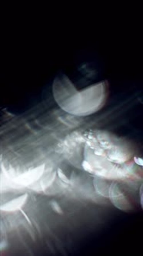 Cinematic Prismatic Light Orbs On Dark Background