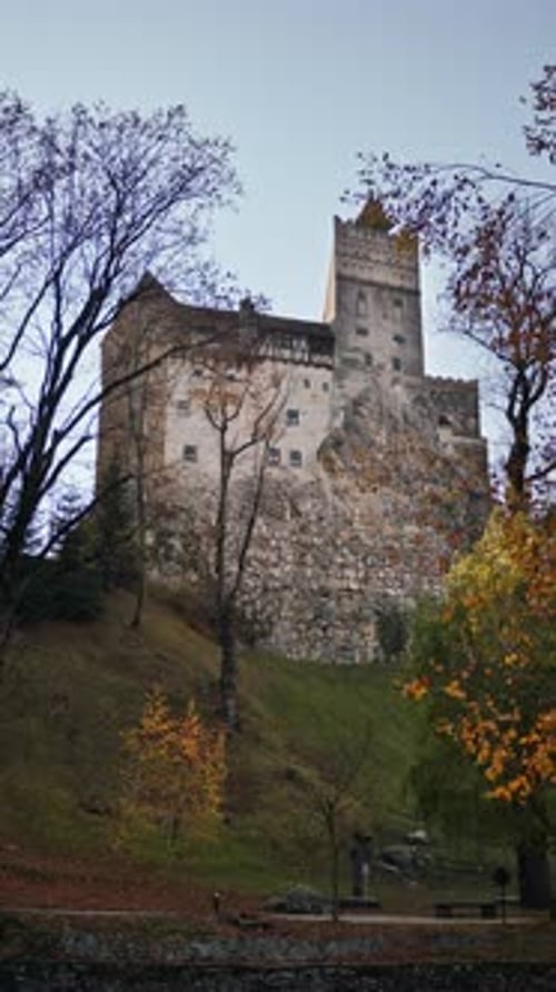 Distant view of the Bran Castle in Bran, Transylvania, Romania. Vertical