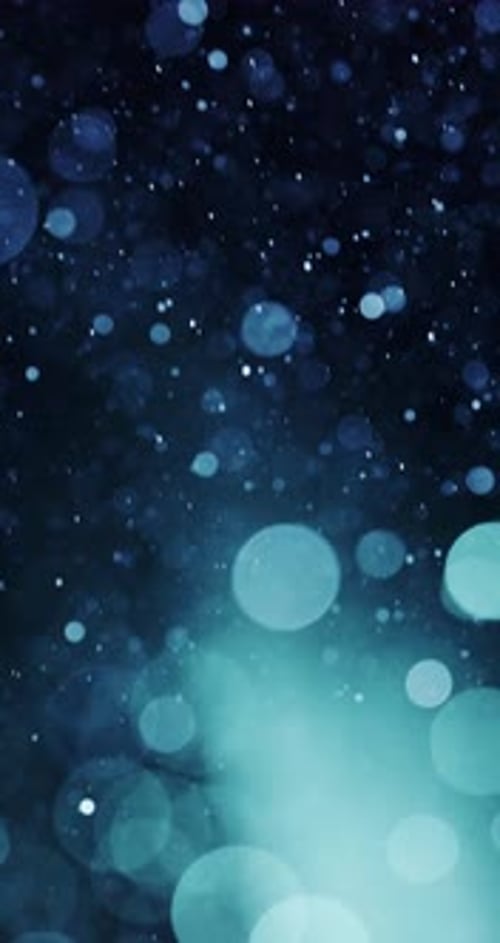 Cyan Particles Ascending With Glowing Bokeh Circles