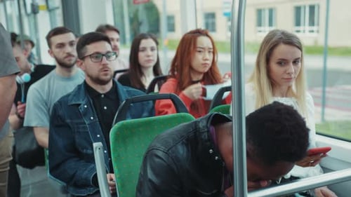 People putting on protective masks riding public transportation