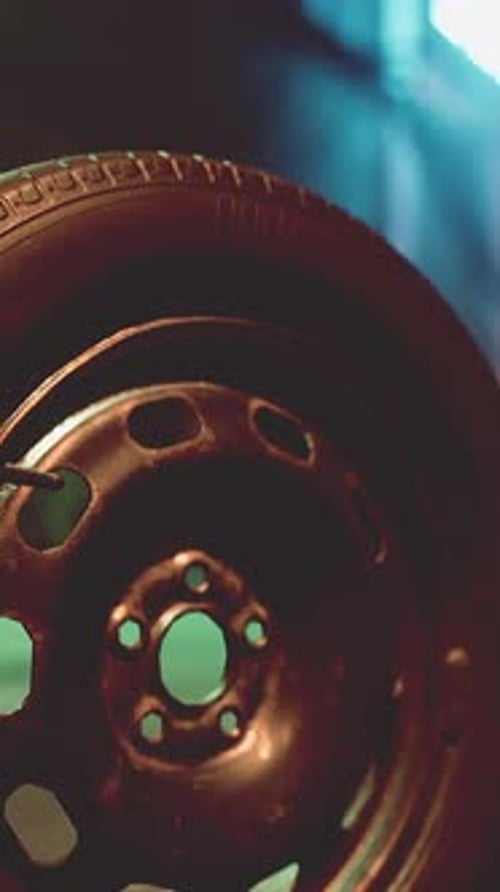 A Close Up of a Tire on a City Street