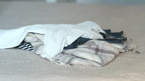 Pile of Clothing Being Added To