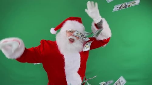 Santa under the money rain rejoicing in profit winning surprises in Xmas sales, on green background.