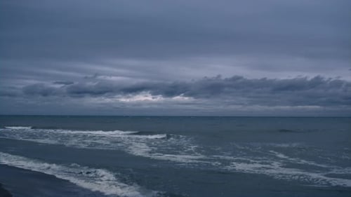 Sea Splashing Landscape Background in Evening Sky Beach. Dark Ocean Waves Breaking