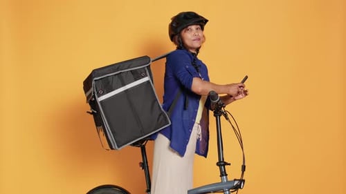 Person With Bike Holding Cellphone