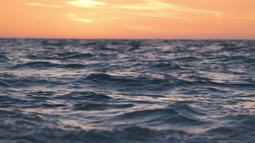 Dramatic Bright Red Sky at Ocean Sunset Soft Evening Clouds Over Sea Dark Water