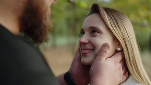 Romantic Couple Enjoying A Tender Moment in Autumn Park