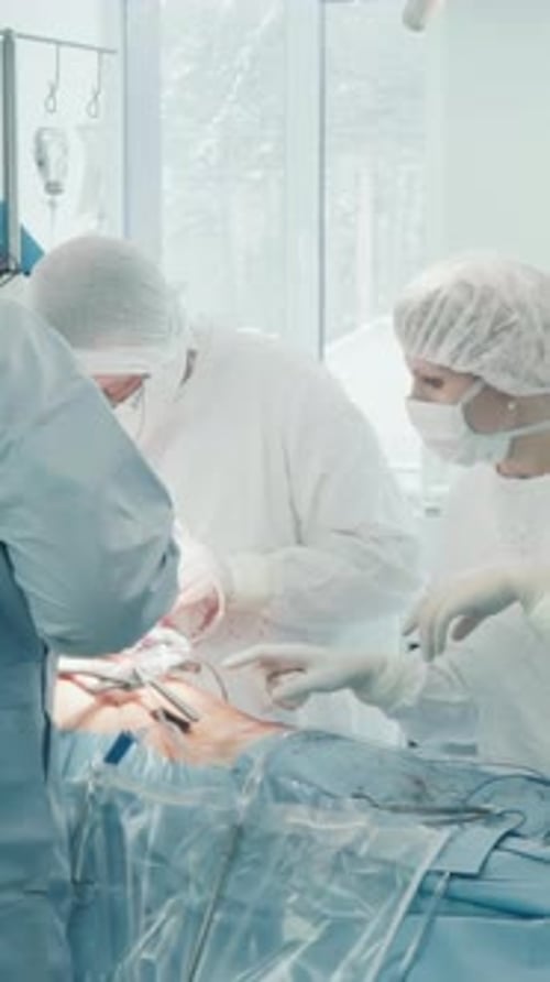 Surgical Team Performs Surgery in Clinic