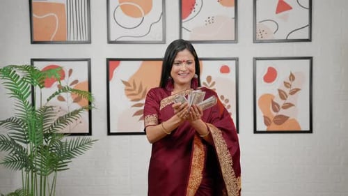 Woman Celebrates, Throwing Money in the Air