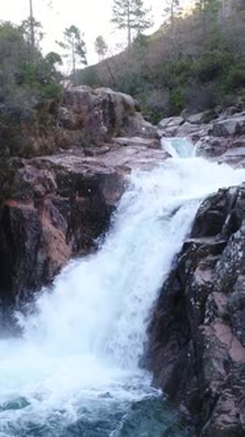 Vertical Video of Beautiful Mountain River with Cascades Flowing on Rocks