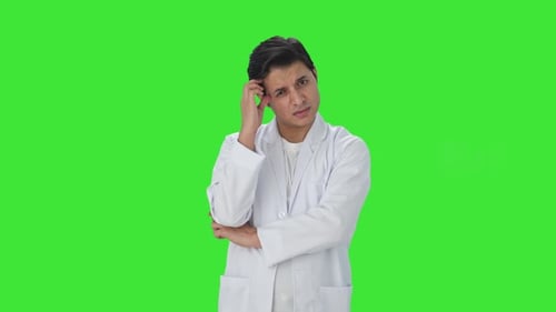 Confused Indian scientist thinking something Green screen