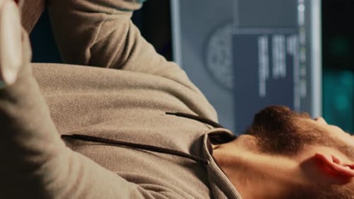 Vertical Video Thoughtful IT Engineer Brainstorming Ideas in Office