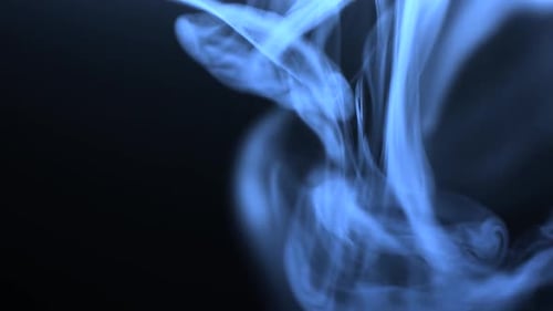 Blue Smoke Swirling in Dark Environment