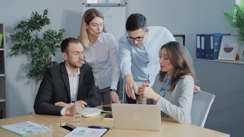 Business Team Collaborating in Modern Office Setting