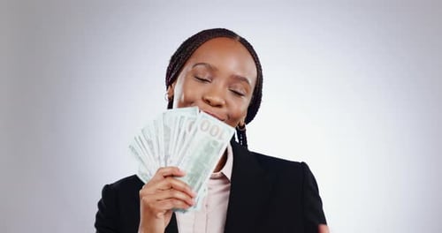 Money fan, smile and black woman in studio with payment, loan or savings cashback on grey