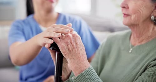Nursing home, hope and nurse with senior woman on a sofa with support, empathy