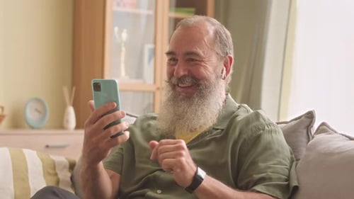 Senior Man Chatting on Phone, Laughing