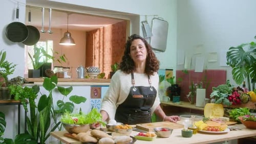 Woman with Fresh Ingredients in Cozy Kitchen