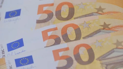Closeup 50 Euro Banknotes of European Union Concept of Savings Banking Tax Payment Economic