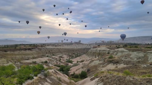 Hot Air Balloons over Breathtaking Cappadocia Landscape