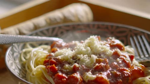 Close Up of Pasta with Tomato Sauce and Cheese