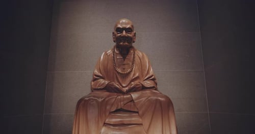 Sacred Deity In A Buddhist Temple