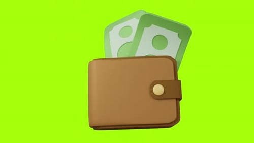Brown wallet with money on green