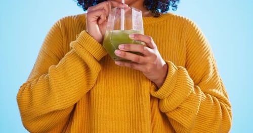 Health juice, black woman hands and healthy green smoothie of a person drinking weight loss drink