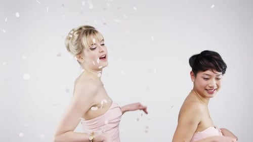 Wedding, dance and crazy bridesmaids with confetti for party celebration, happiness and joyful mood