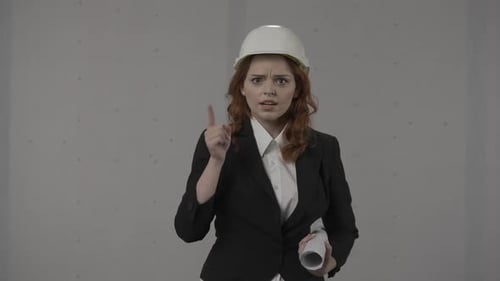 A Woman Architect Indignantly Points at Someone Swears and Screams Portrait of a Woman in a