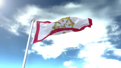 Waving Spiritual Flag with Golden Emblem in Blue Sky