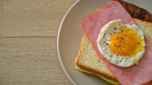 Delicious Sandwich with Fried Egg and Sausage