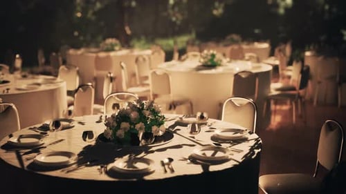 Restaurant Tables Ready for Guests but No One in Sight
