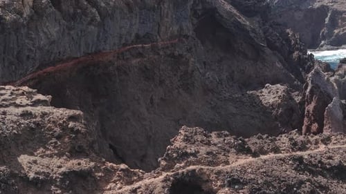 Volcanic Landscape Revealing Solidified Lava Flows Rugged Rocky Terrain Ideal for Hiking on La Palma
