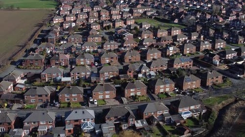 Aerial Drone View of Quiet Suburban Neighborhood and Residential Housing Development