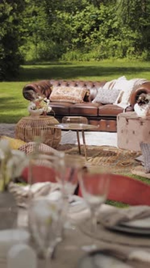 Vertical Video Photo Zone at a Wedding with a Large Sofa and an Elegant Outdoor Wedding Dinner with