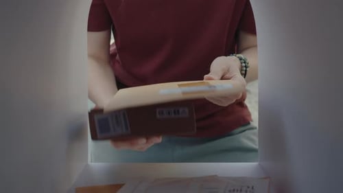 Placing Package in Mailbox: Unique Perspective