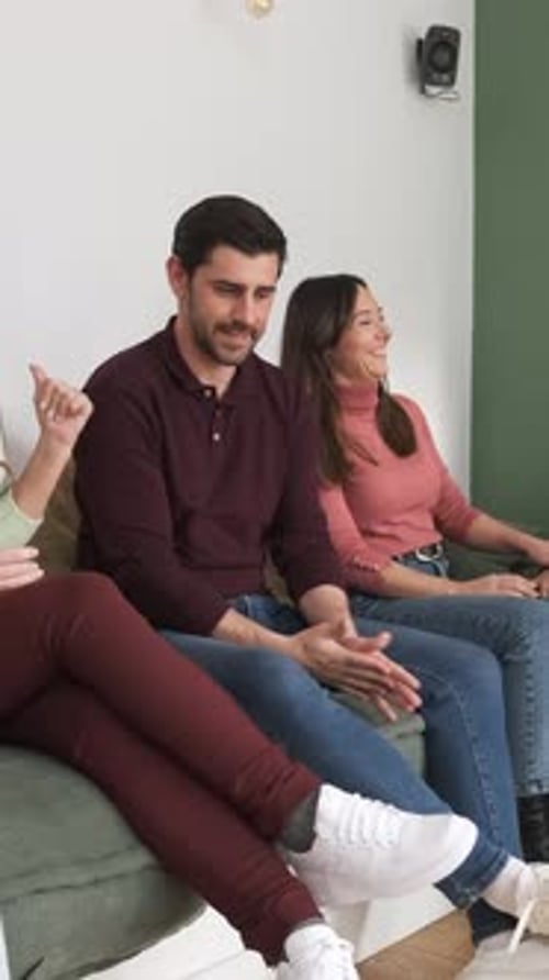 Friends Talking and Relaxing on Couch