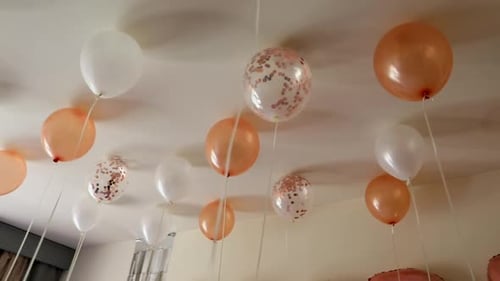 Colorful Balloons Floating in Decorated Celebration Room