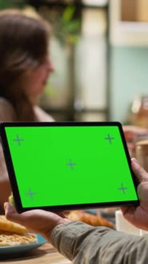 Vertical Video Mockup Screen on Tablet with Father Gathered for Breakfast with His Family