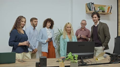 Team Celebrates Success at Modern Office Workplace