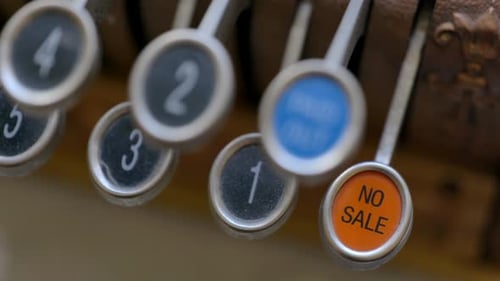 Finger Pushing No Sale Button on Old Cash Register