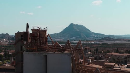 Abandoned Cement Factory with Old Rusty Machinery and Conveyor Belts