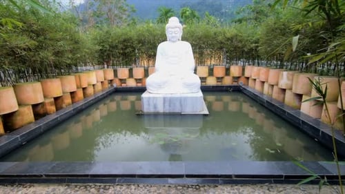 smooth stable slow dolly zoom shot of buddha statue