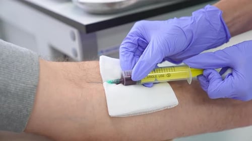 Taking blood for analysis in a hospital.