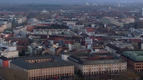 Picturesque Aerial View Orbiting Around Iconic Karlsruhe Palace Tower and Vast Schlossgarten with