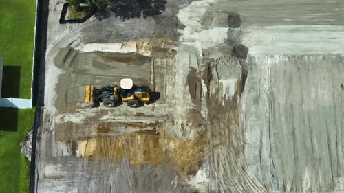 Groundwork Moving Tractor Preparing Place for Future House Foundation Construction Leveling Soil for