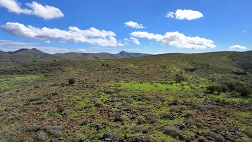 Aerial view of green hills and mountains, United States.