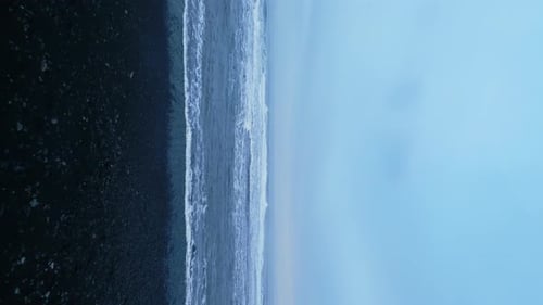 Vertical Video Drone Shot of Nordic Ocean Shore